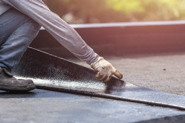 Professional Basement Waterproofing technician working in Sterling, GA